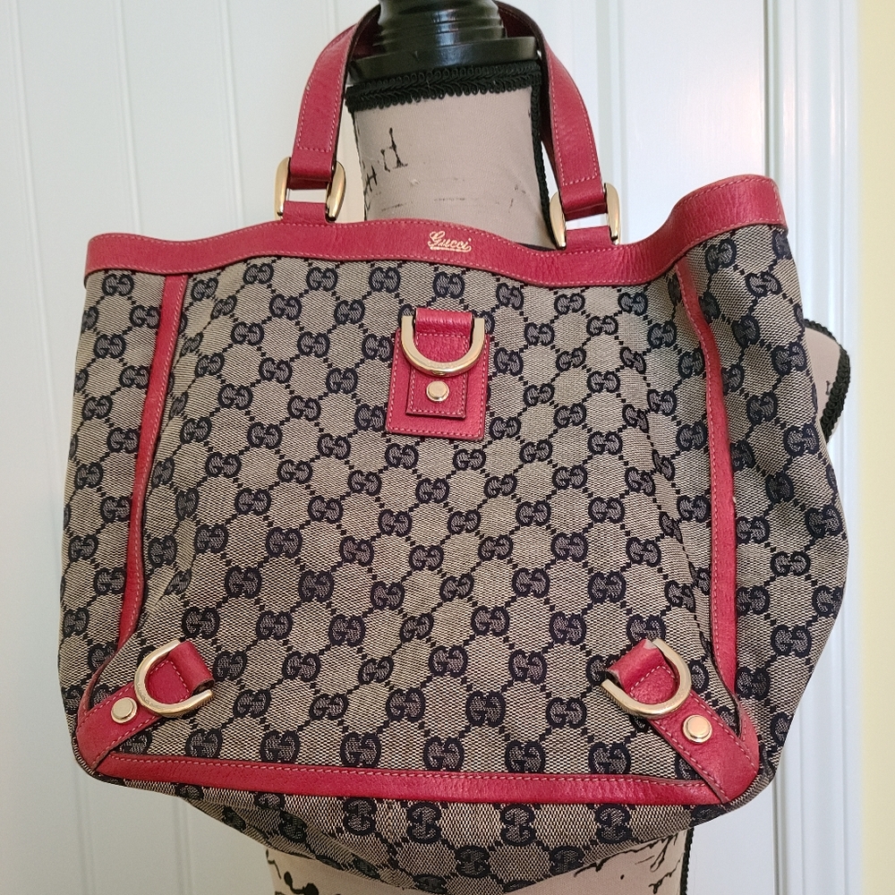 Gucci Tote showing serial numbers.